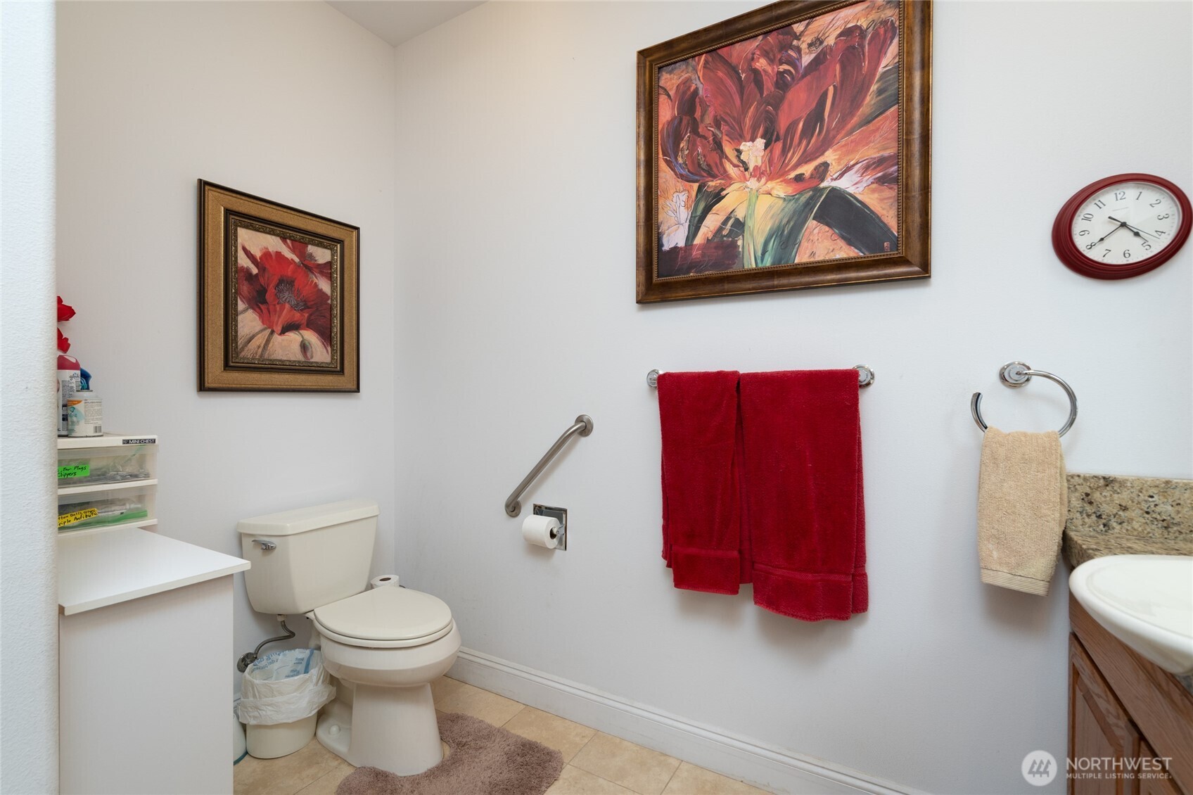 4111 R Avenue Anacortes, WA 98221 - Photo 23 of 37 a bathroom with a toilet and a picture on the wall