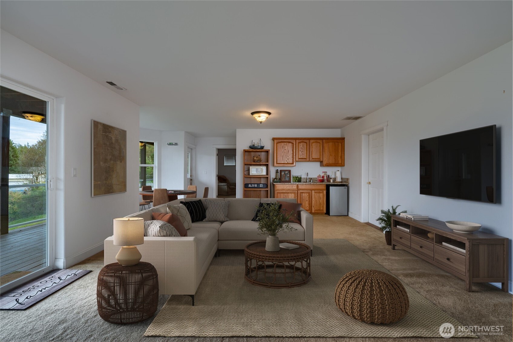 4111 R Avenue Anacortes, WA 98221 - Photo 26 of 37 a living room with furniture and a flat screen tv