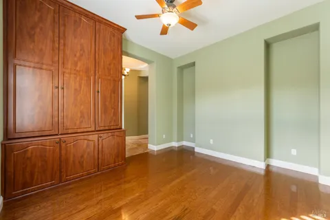 a view of a livingroom with wooden floor