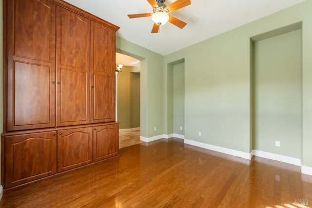 a view of a livingroom with wooden floor
