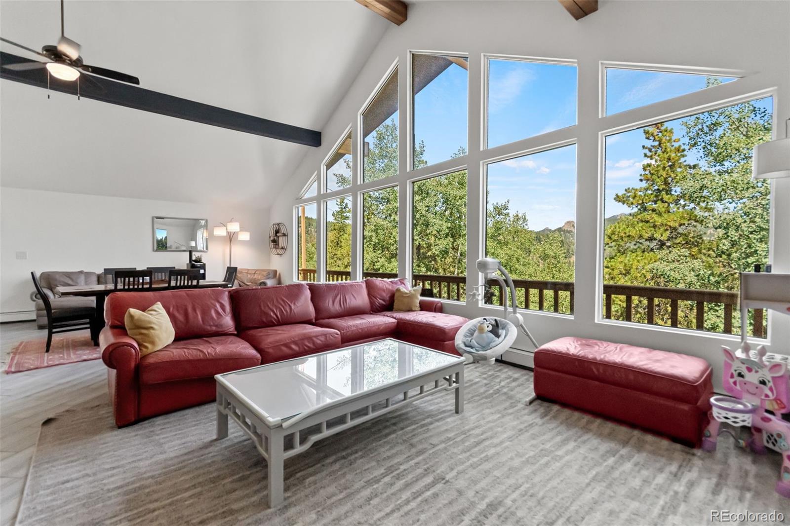 4316 Smith Hill Road Black Hawk, CO 80422 - Photo 15 of 48 a living room with furniture and a large window