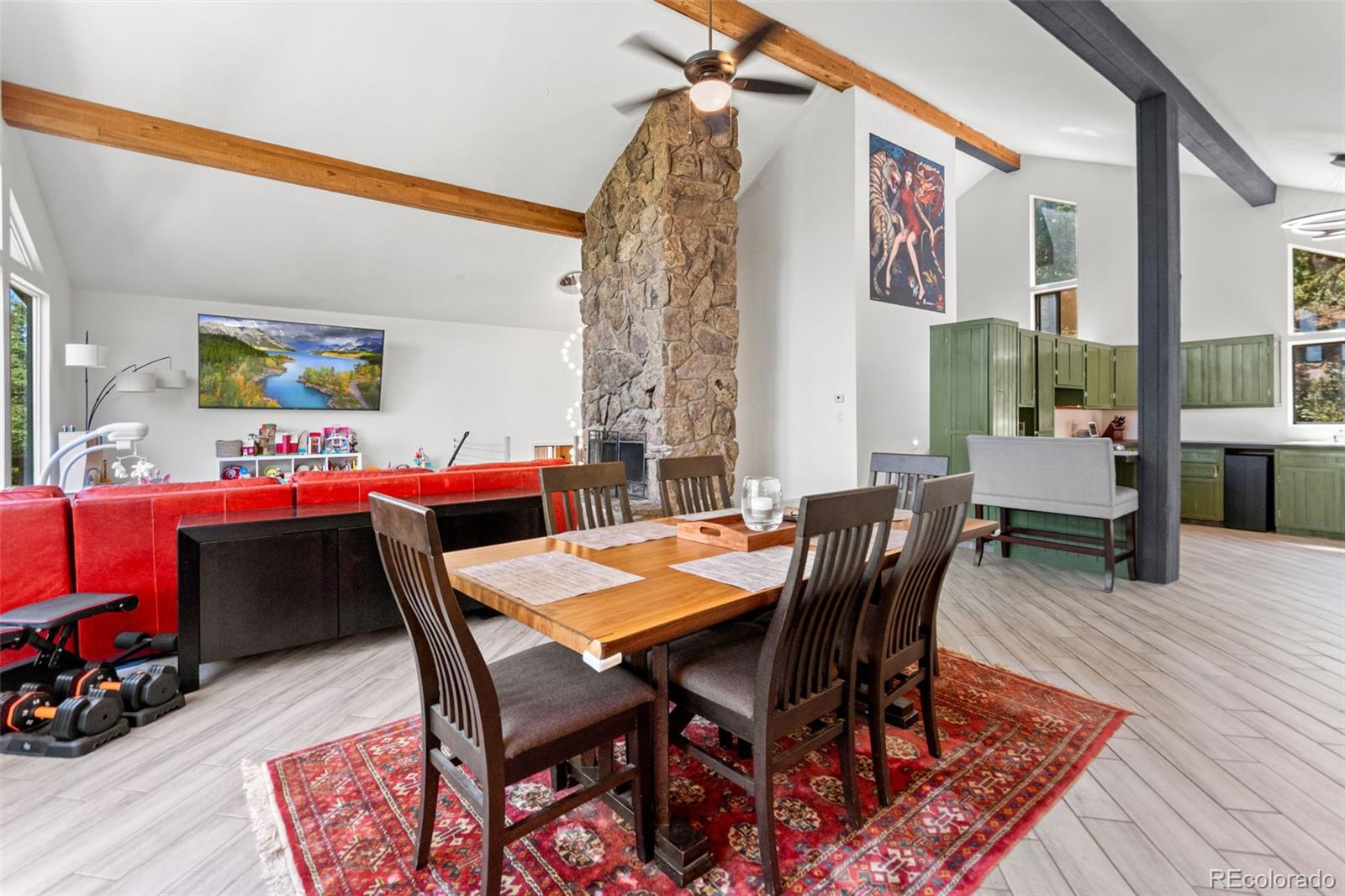 4316 Smith Hill Road Black Hawk, CO 80422 - Photo 21 of 48 a dining room with furniture and wooden floor