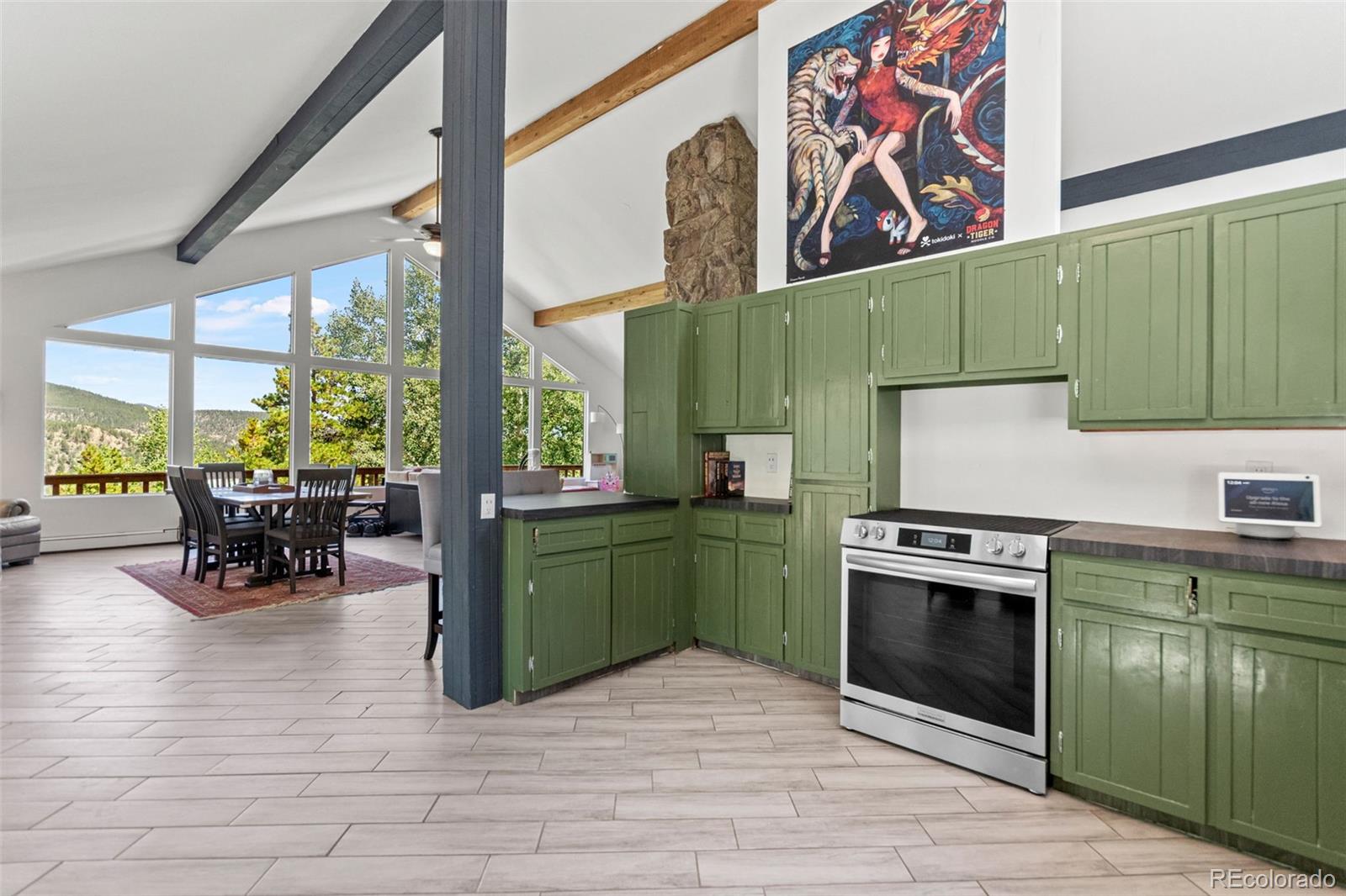 4316 Smith Hill Road Black Hawk, CO 80422 - Photo 25 of 48 a kitchen with lots of counter top space and stainless steel appliances