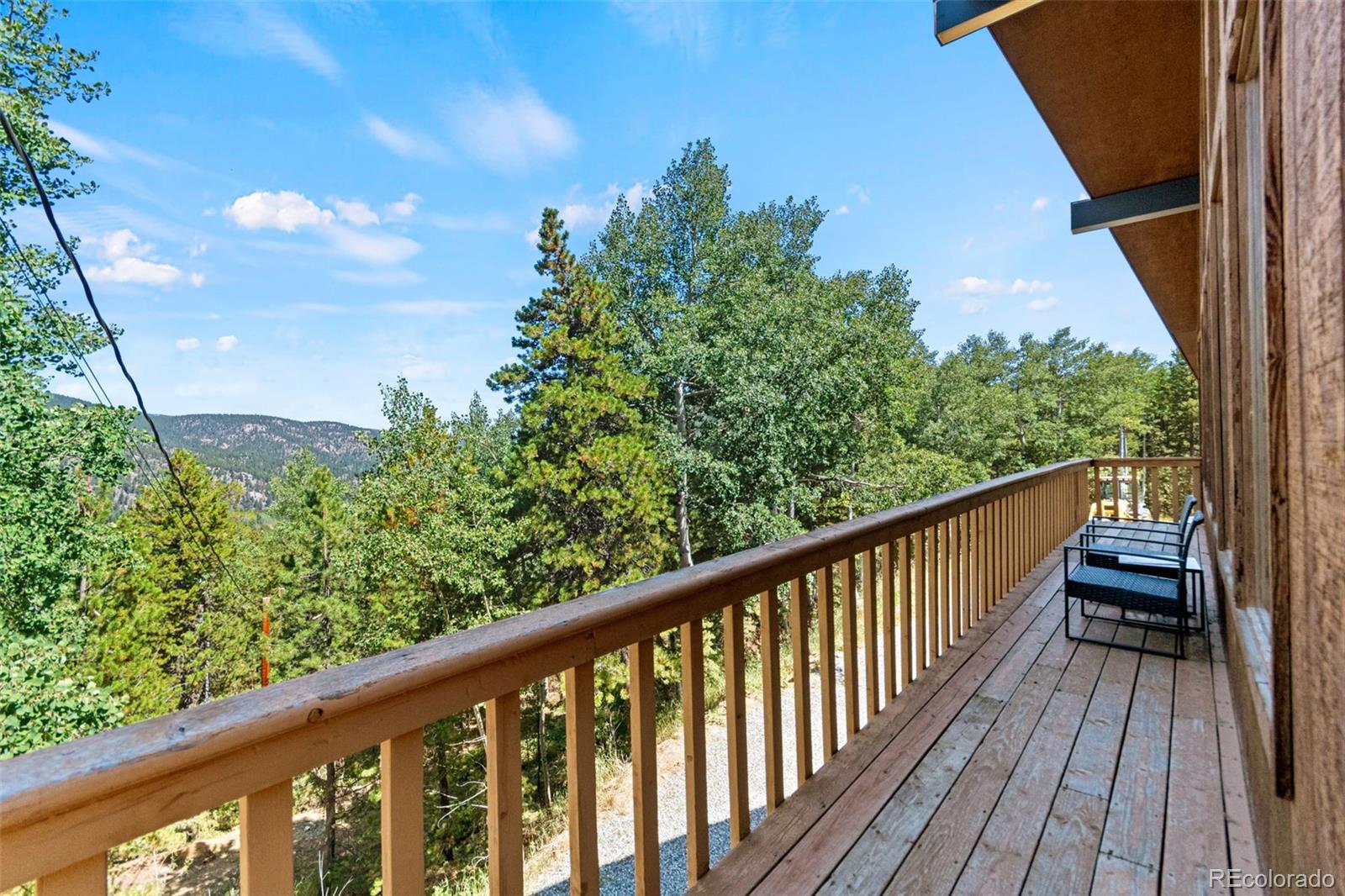 4316 Smith Hill Road Black Hawk, CO 80422 - Photo 28 of 48 a view of balcony with wooden floor
