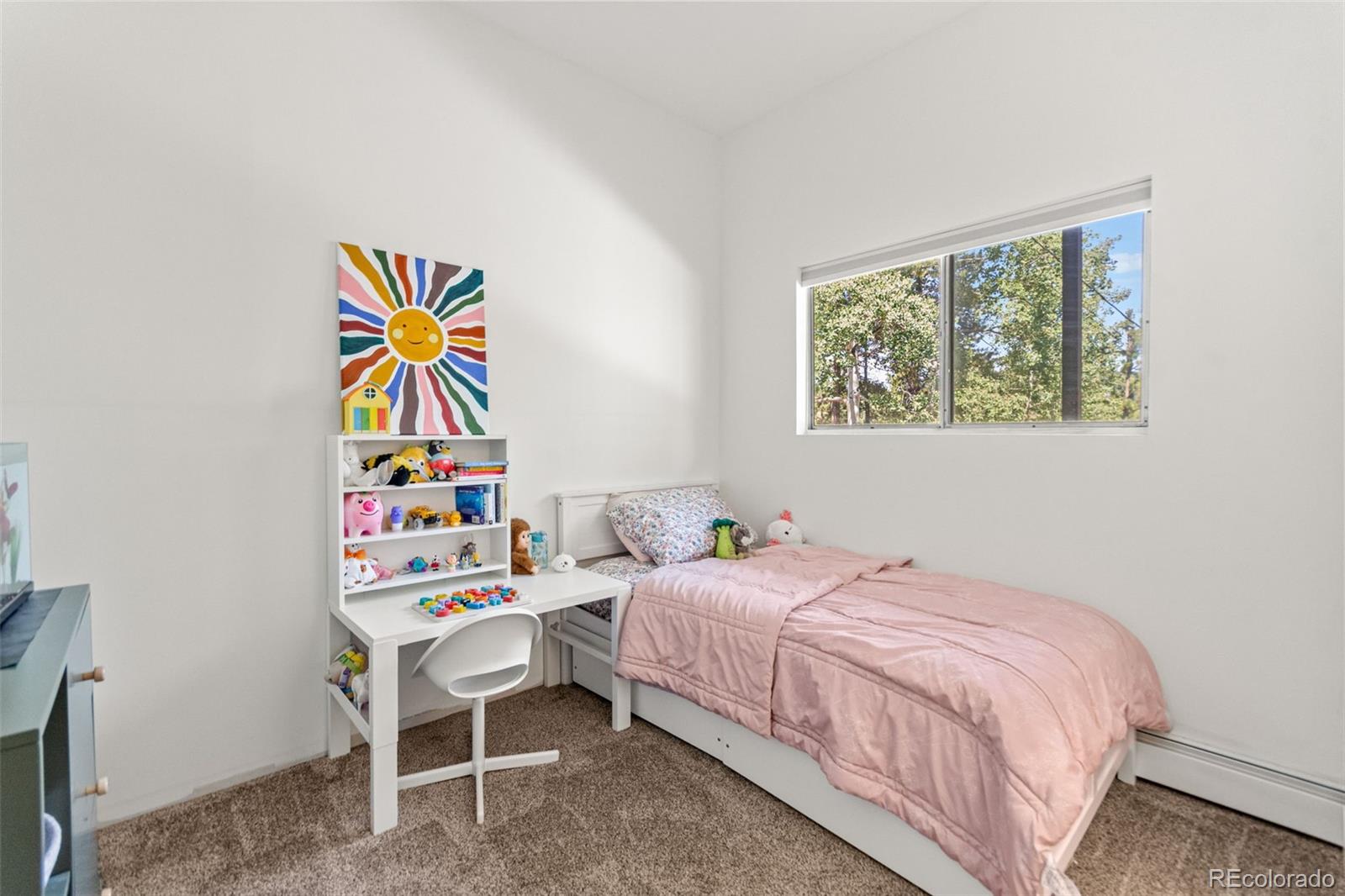 4316 Smith Hill Road Black Hawk, CO 80422 - Photo 37 of 48 a bedroom with a bed and a window