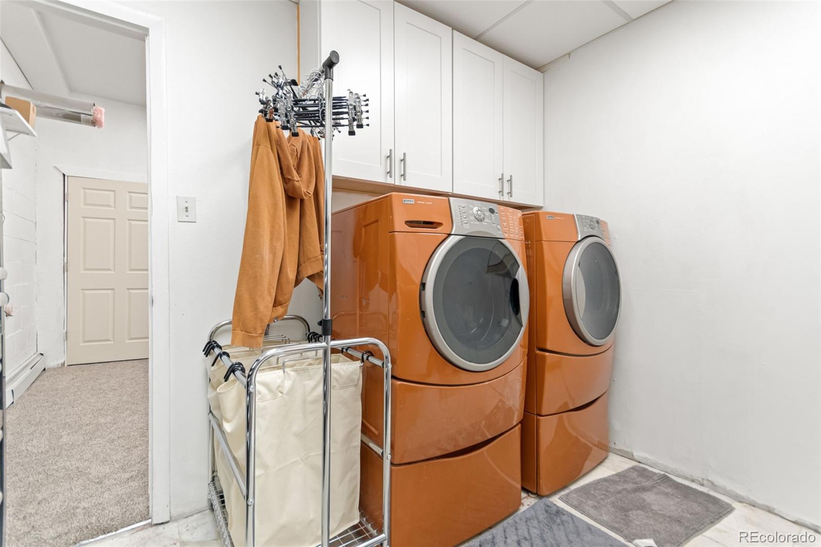 4316 Smith Hill Road Black Hawk, CO 80422 - Photo 40 of 48 a view of a room with rack on the wall and chandelier