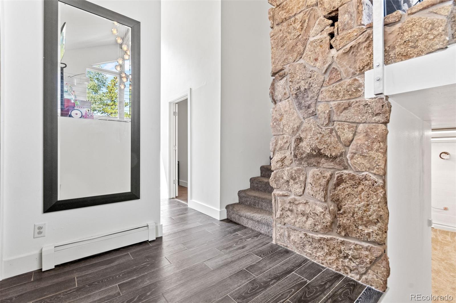 4316 Smith Hill Road Black Hawk, CO 80422 - Photo 4 of 48 en view of an entryway with wooden floor