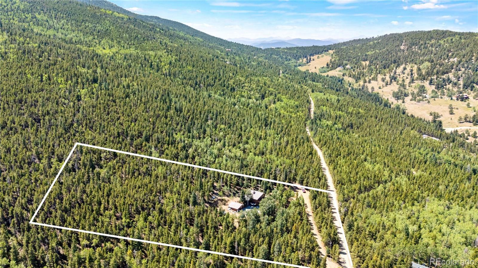 4316 Smith Hill Road Black Hawk, CO 80422 - Photo 44 of 48 a view of a forest