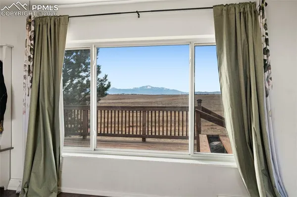 a view of a balcony from a door