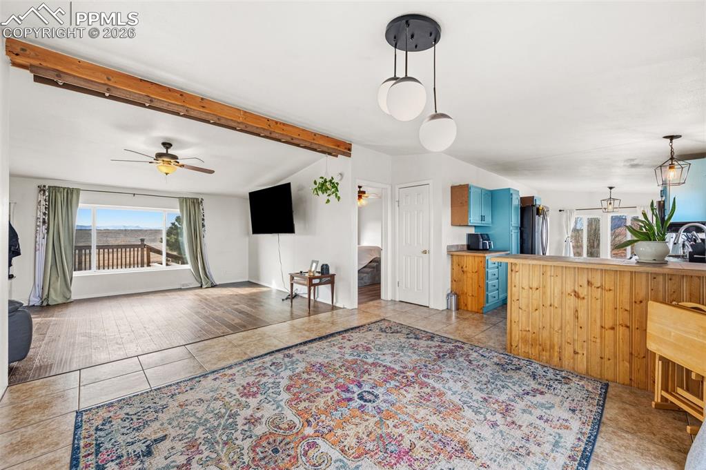 5535 Peerless Farms Road Peyton, CO 80831 - Photo 7 of 27 a view of a living room and a fireplace