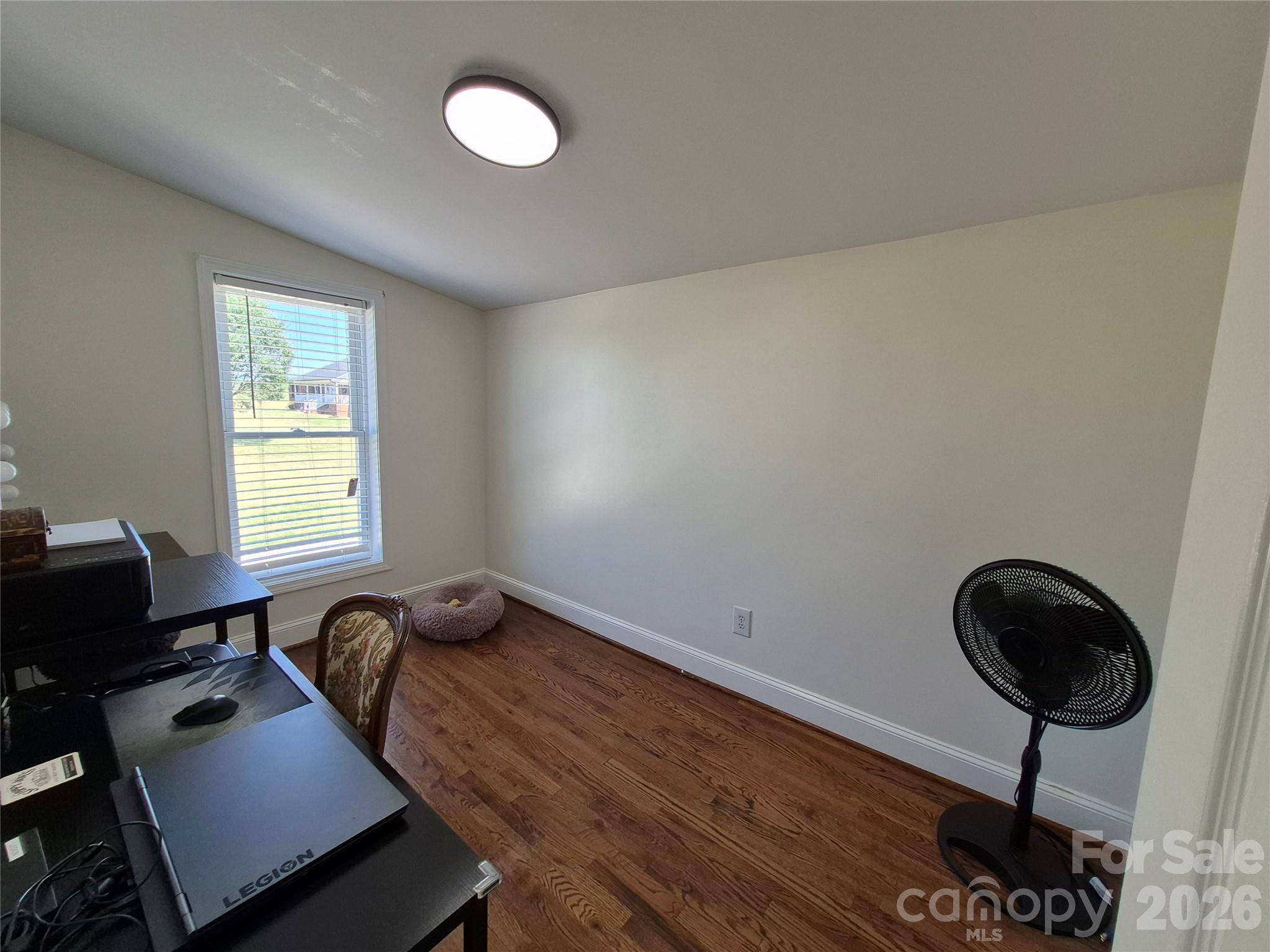 4438 Reepsville Road Vale, NC 28168 - Photo 28 of 32 a bed room with furniture and a window