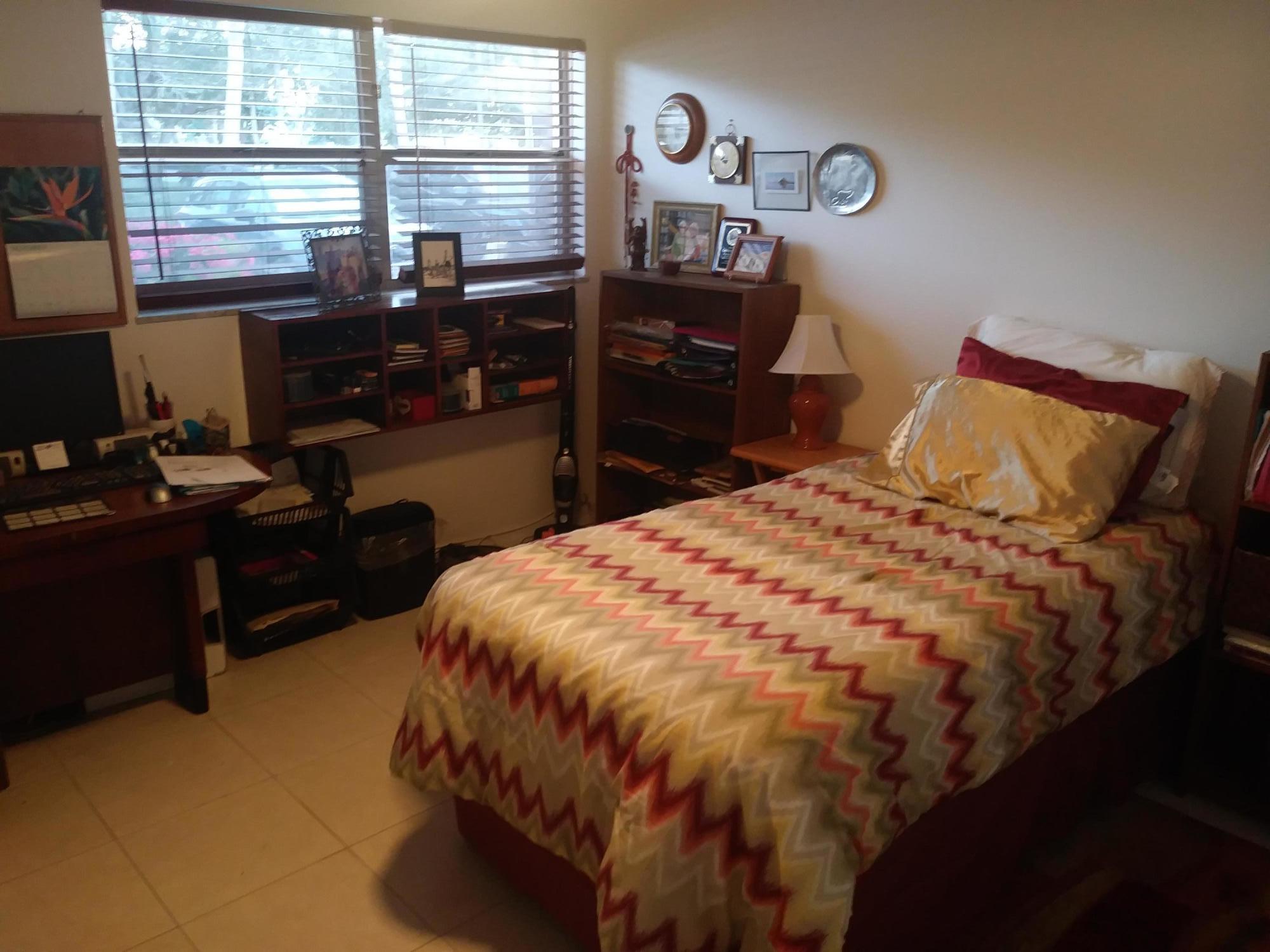 1188 Commodore Court, Unit 105 Fort Pierce, FL 34949 - Photo 18 of 27 Guest Bedroom