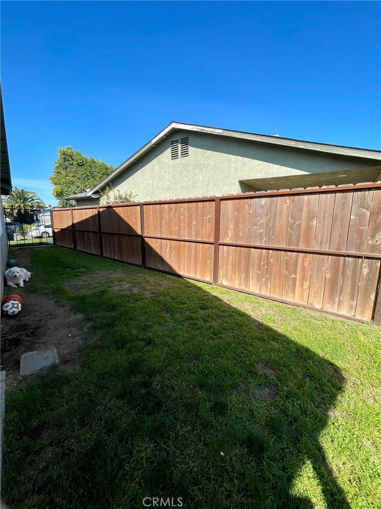 9654 Timothy Court Delhi, CA 95315 - Photo 15 of 18 a view of a backyard with a garden