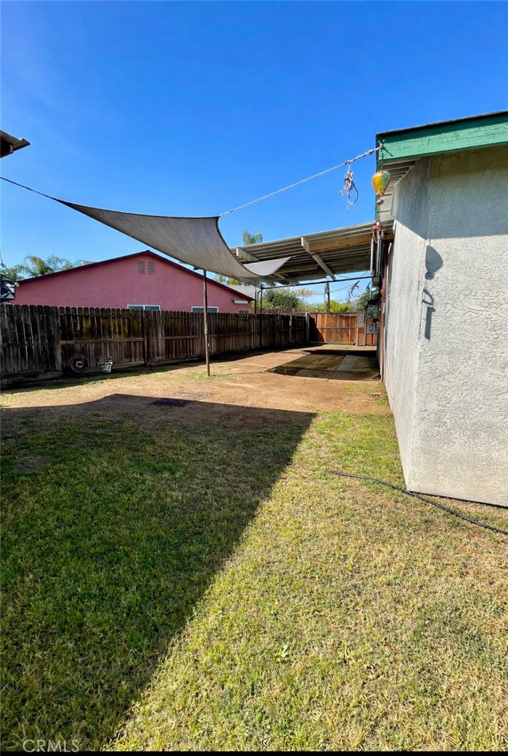 9654 Timothy Court Delhi, CA 95315 - Photo 17 of 18 a view of a backyard