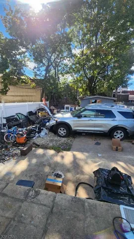 a view of swimming pool outdoor seating and ocean view