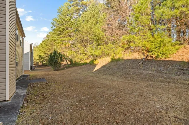 a view of a yard with an trees