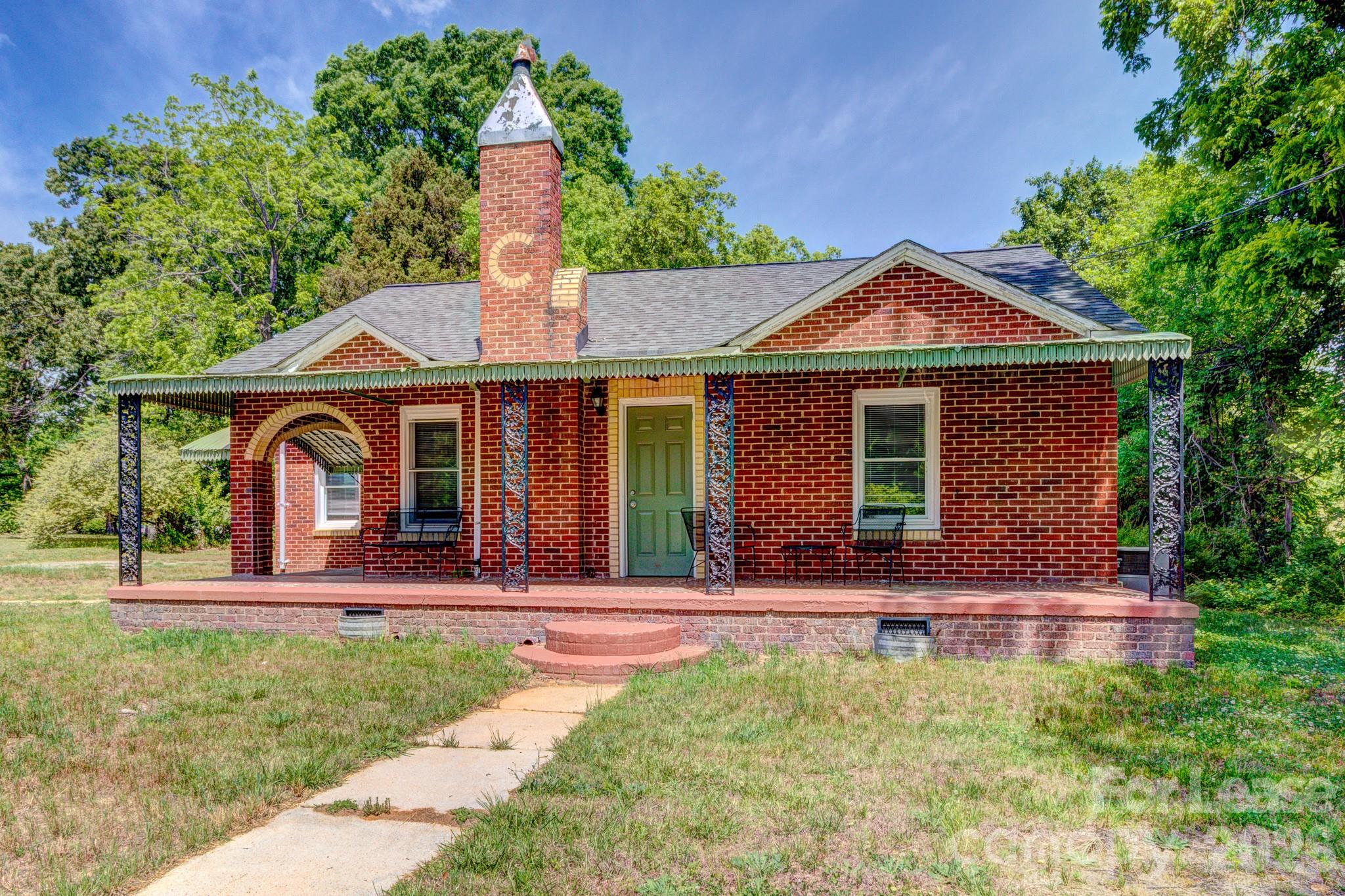1006 Delview Road Cherryville, NC 28021 - Photo 3 of 10 a front view of a house with a yard