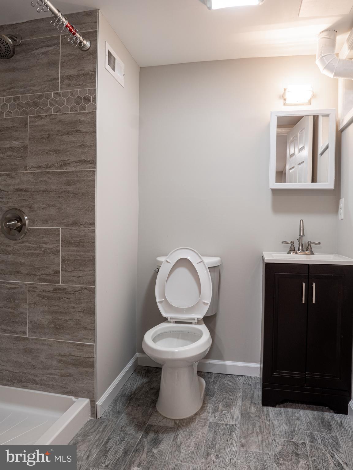 1304 Kitmore Road Baltimore, MD 21239 - Photo 17 of 29 Lower level full bathroom