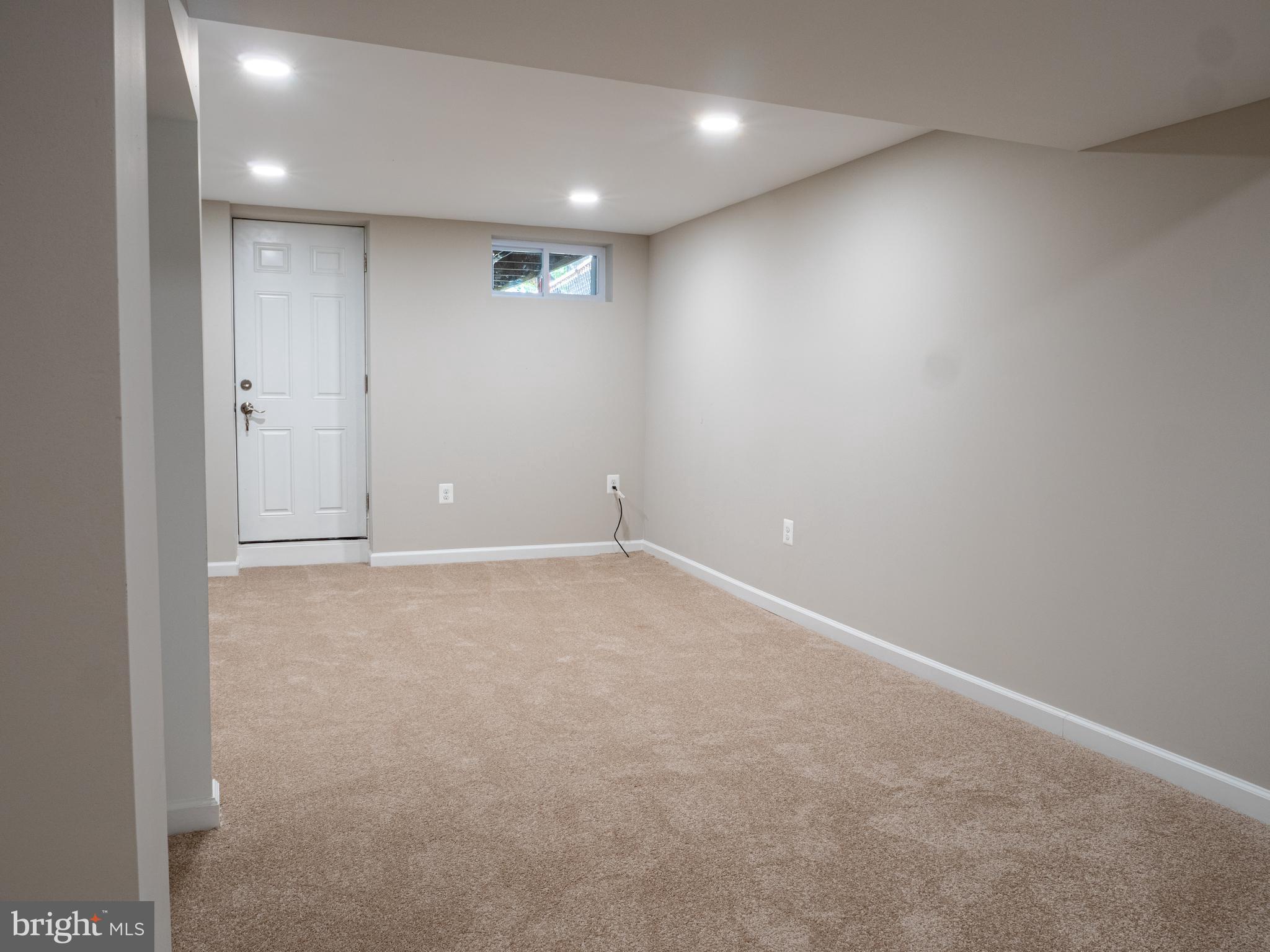 1304 Kitmore Road Baltimore, MD 21239 - Photo 21 of 29 Lower level rec. room
