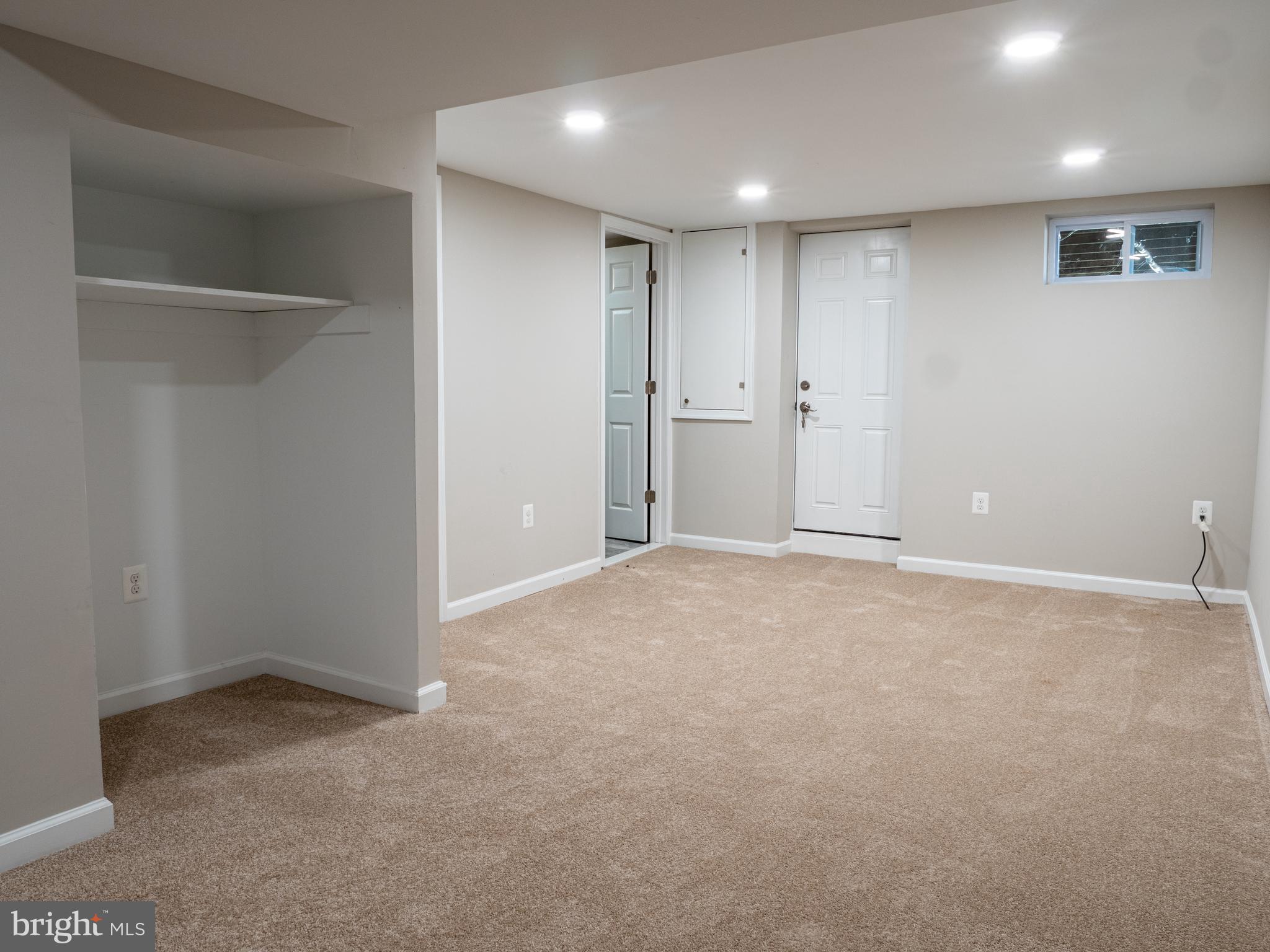 1304 Kitmore Road Baltimore, MD 21239 - Photo 22 of 29 Lower level rec room / open space