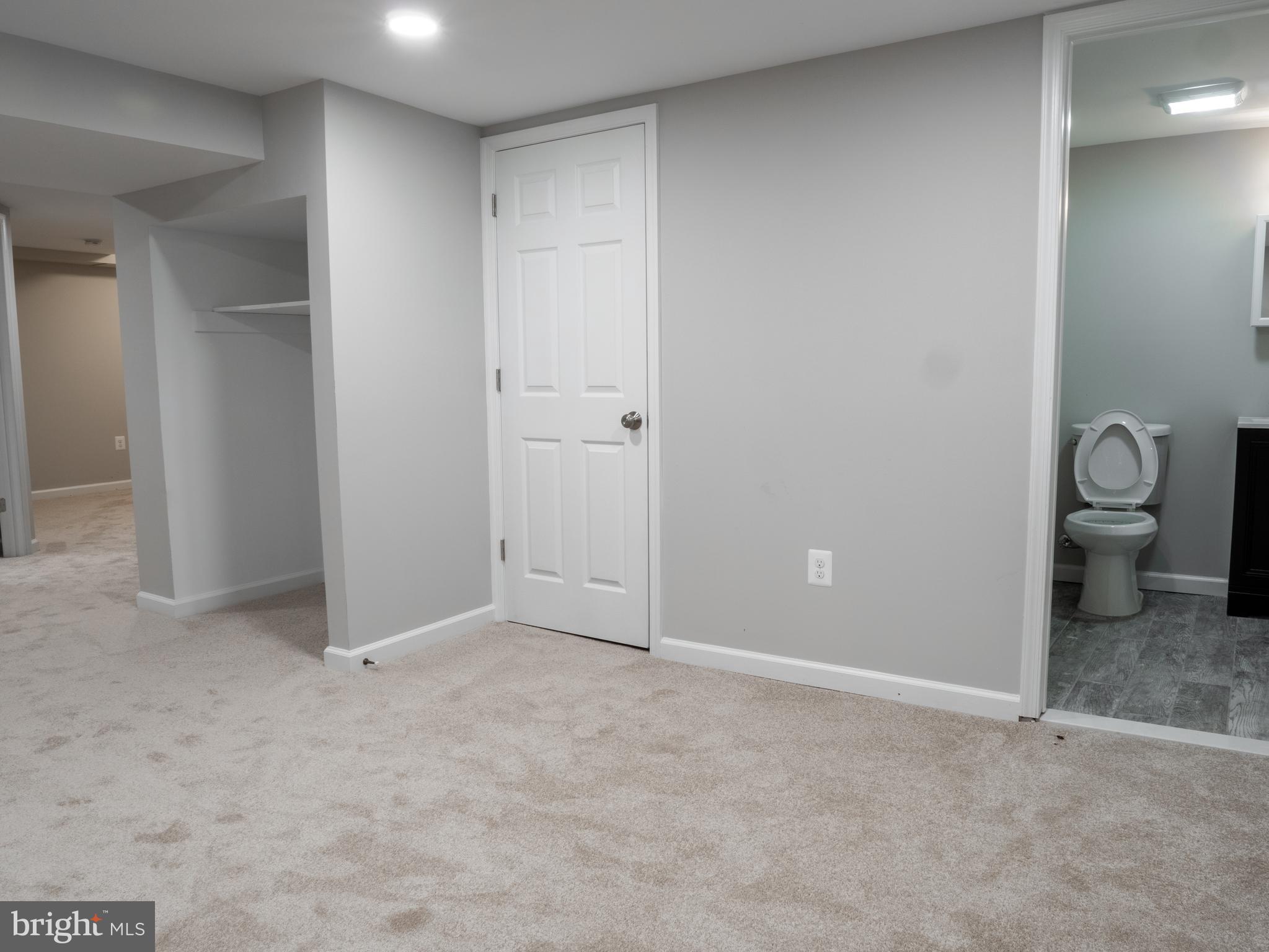 1304 Kitmore Road Baltimore, MD 21239 - Photo 23 of 29 Rec Room in to full bath in lower level