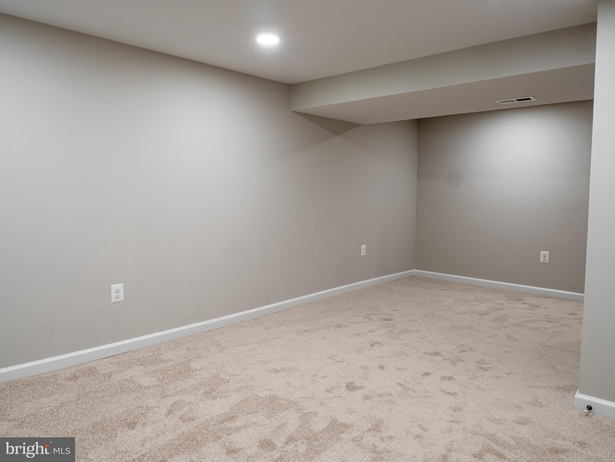 1304 Kitmore Road Baltimore, MD 21239 - Photo 24 of 29 Lower level rec room / family room area