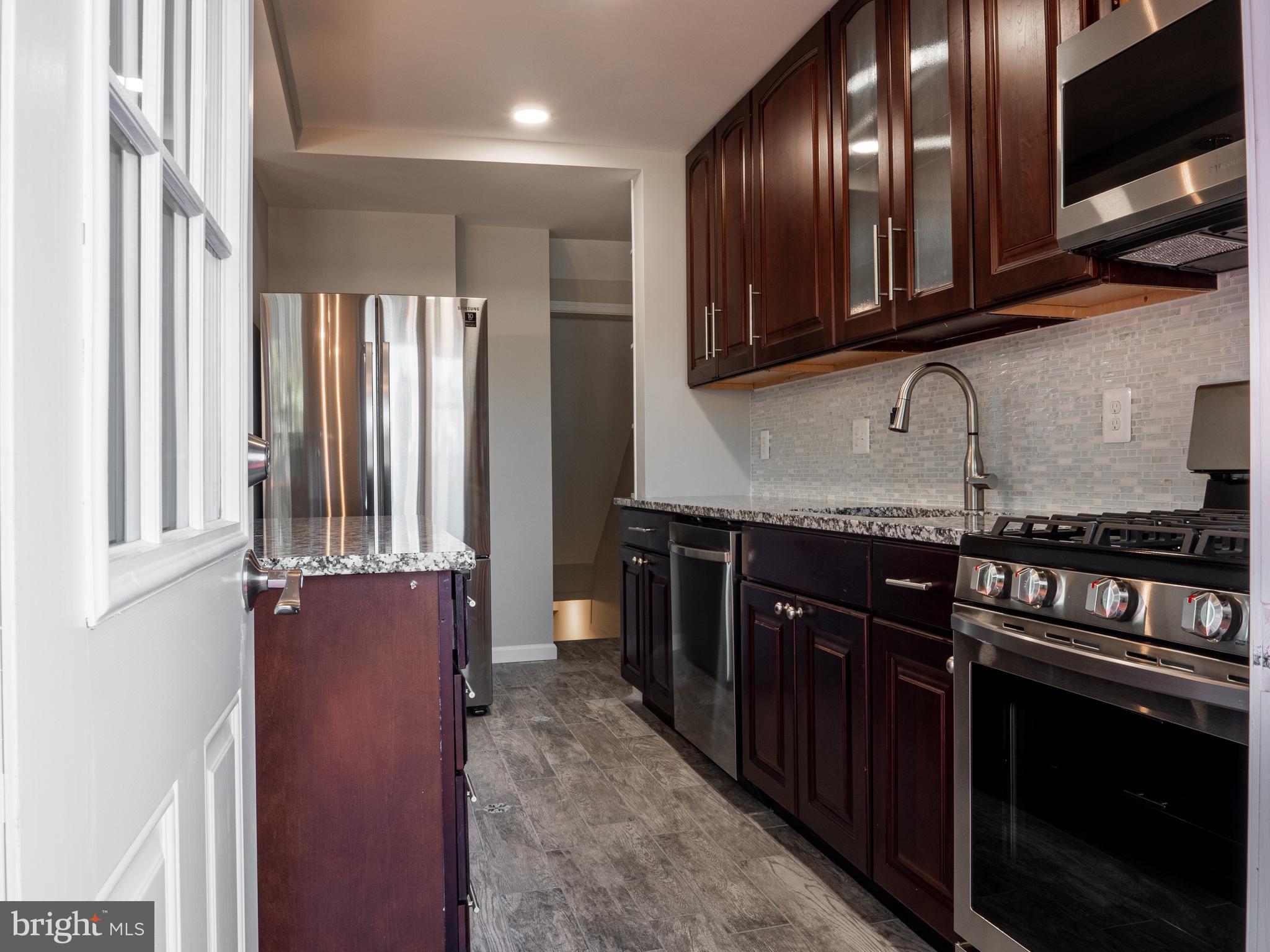 1304 Kitmore Road Baltimore, MD 21239 - Photo 8 of 29 Kitchen from walk out to deck
