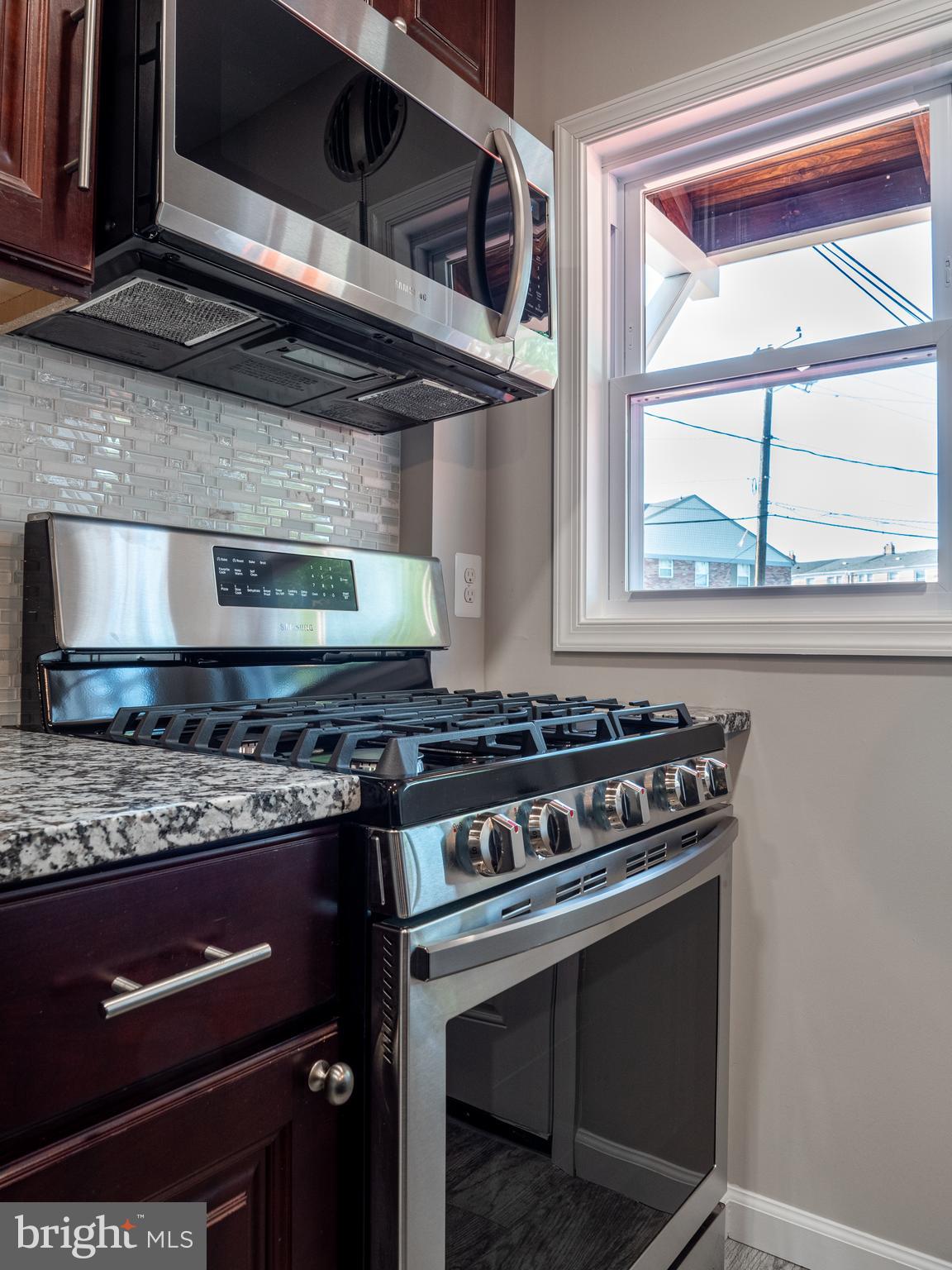 1304 Kitmore Road Baltimore, MD 21239 - Photo 9 of 29 Kitchen Range and built in microwave