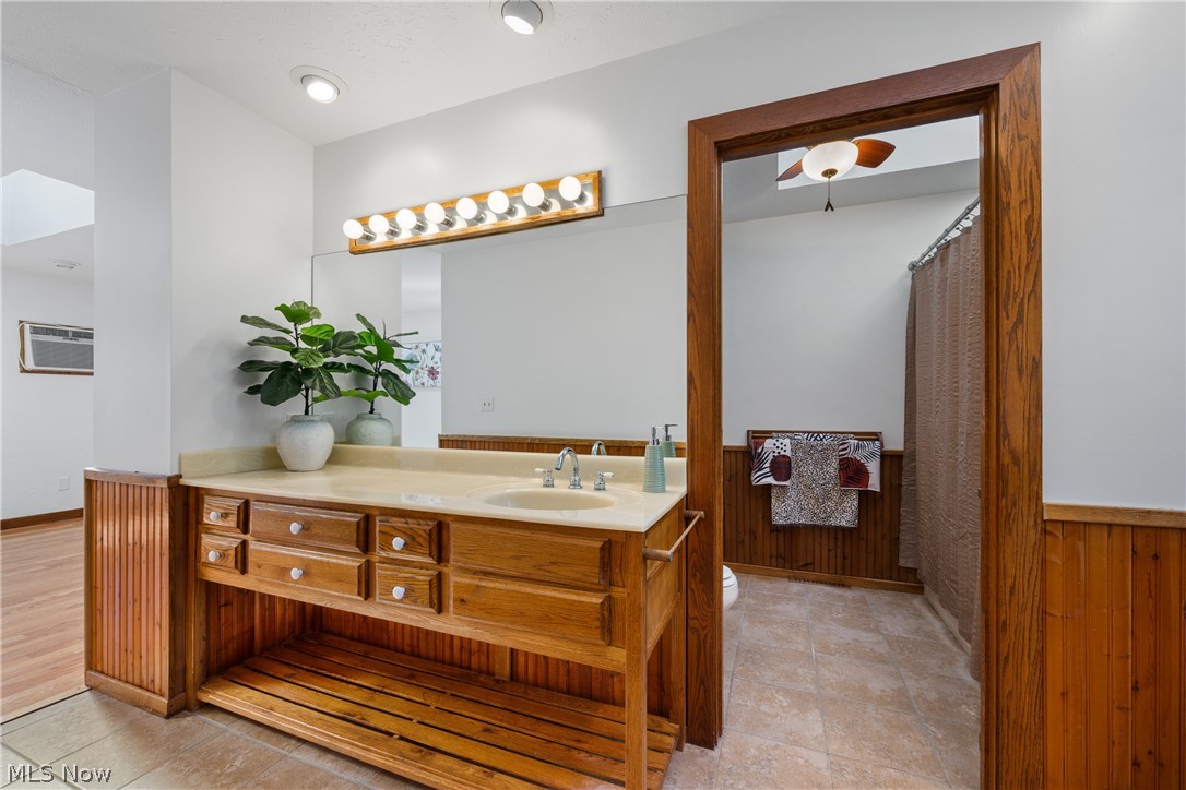 490 Johnson Road Kent, OH 44240 - Photo 24 of 49 Vanity area of primary bath. Door leads to commode and tub/shower combo.