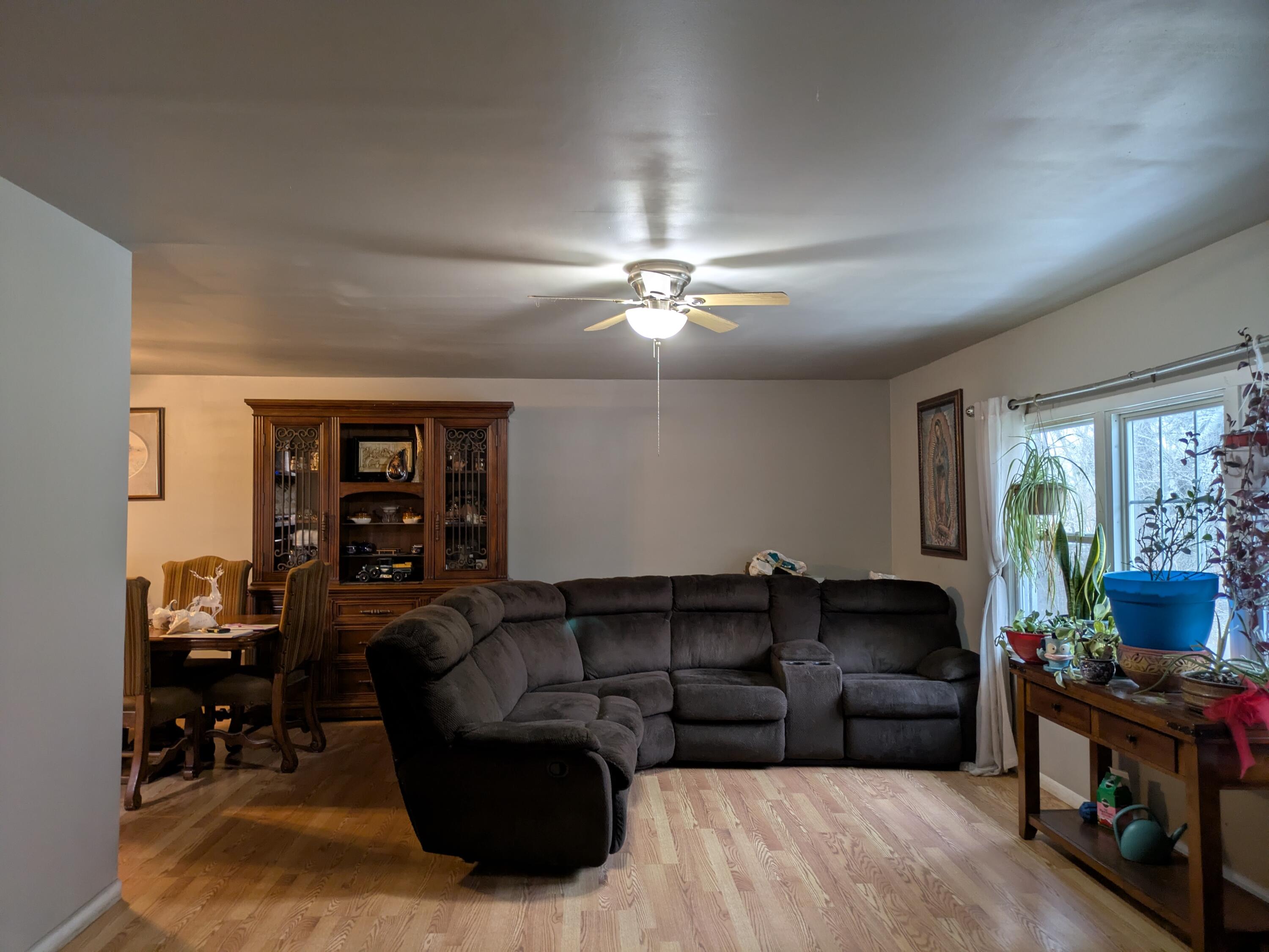 23180 Whitcomb Street Lowell, IN 46356 - Photo 7 of 22 a living room with furniture and a flat screen tv