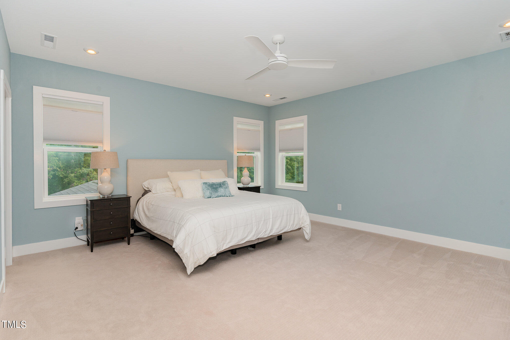 183 Post Oak Road Chapel Hill, NC 27516 - Photo 22 of 51 a spacious bedroom with a bed and a window