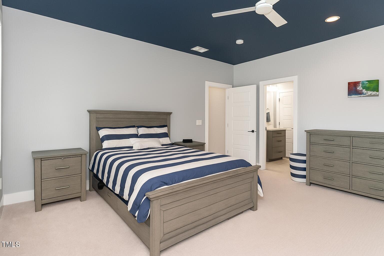183 Post Oak Road Chapel Hill, NC 27516 - Photo 25 of 51 a bedroom with a bed and dresser