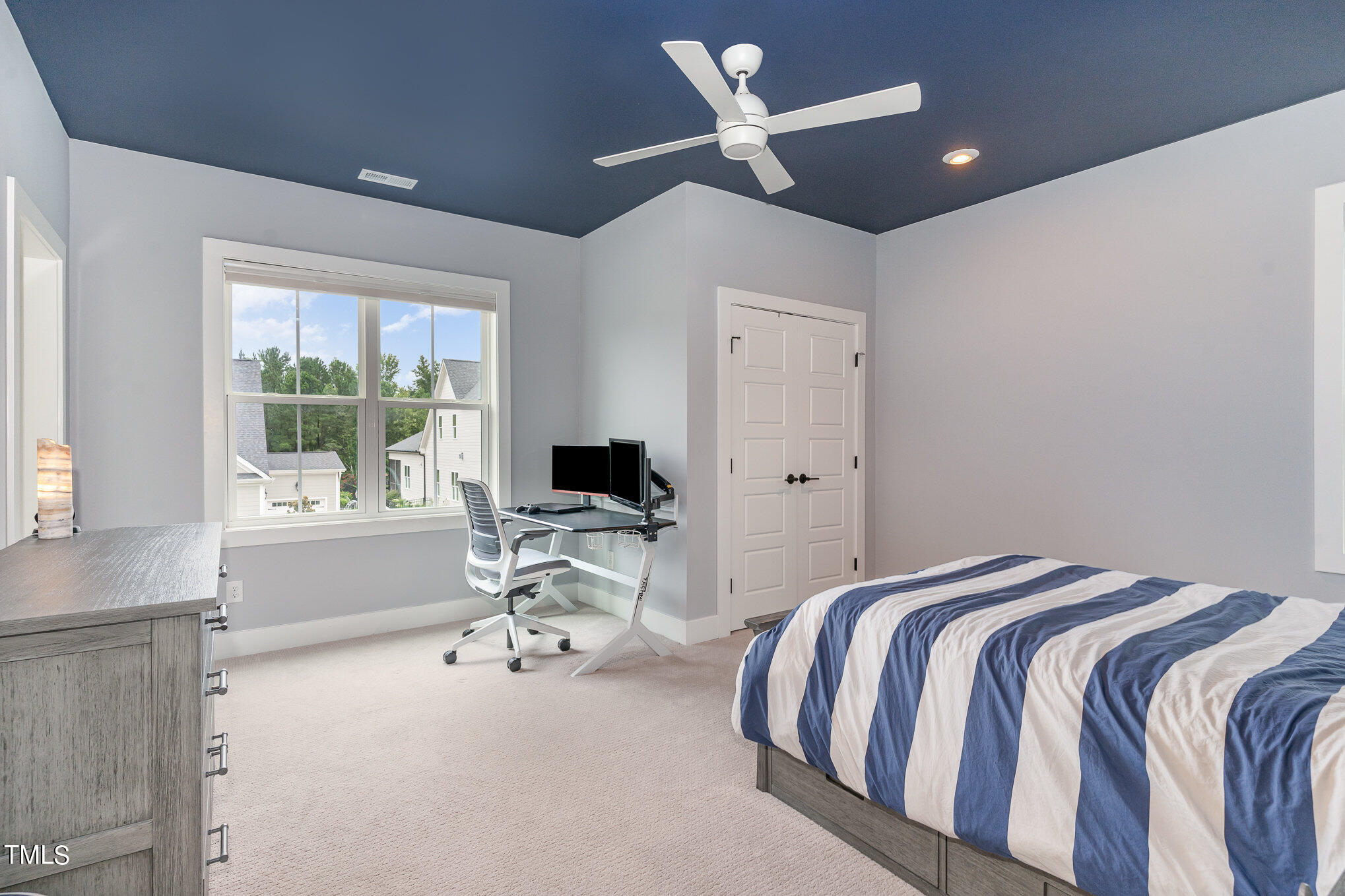 183 Post Oak Road Chapel Hill, NC 27516 - Photo 27 of 51 a spacious bedroom with a bed and a large window
