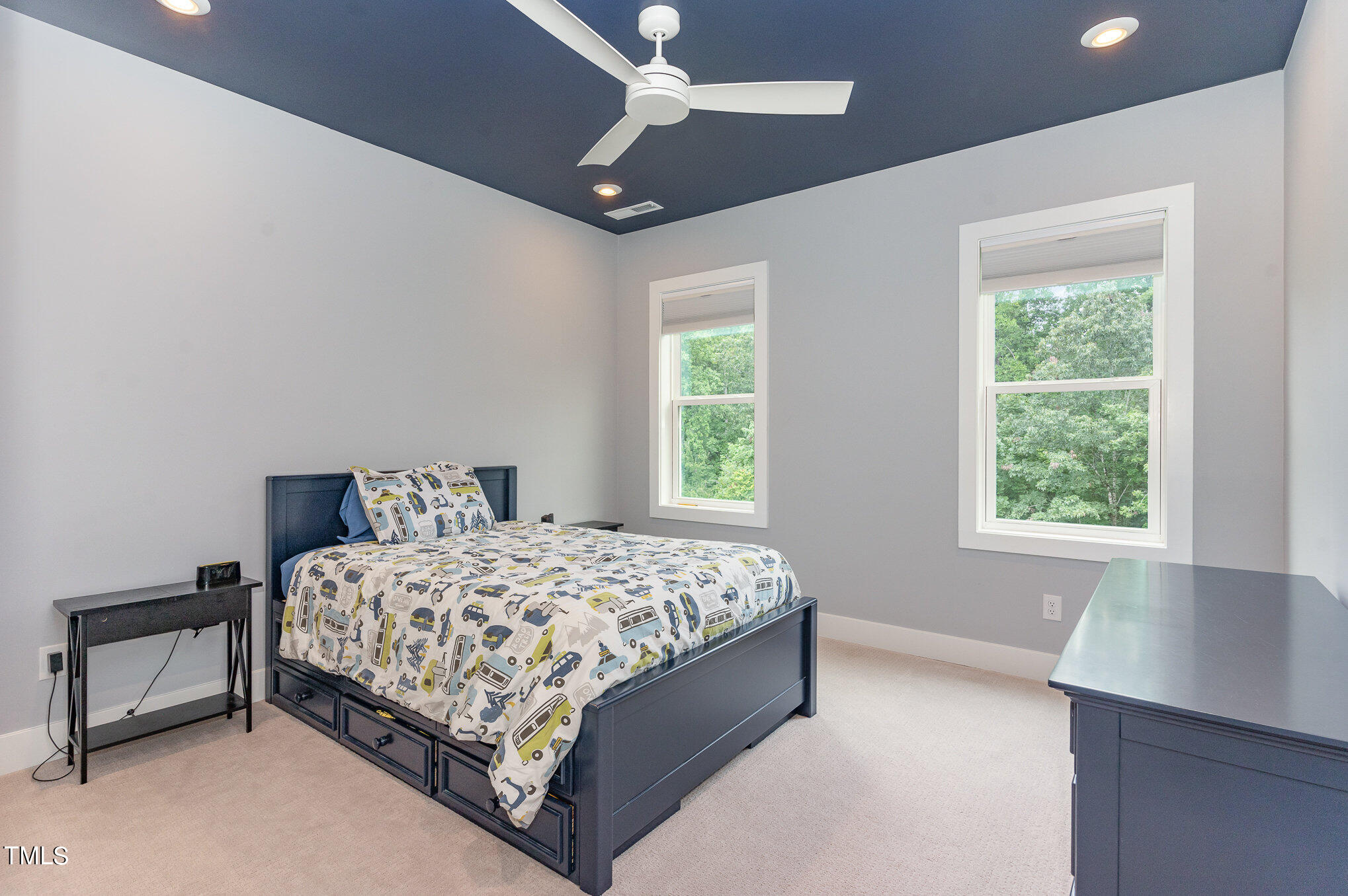 183 Post Oak Road Chapel Hill, NC 27516 - Photo 29 of 51 a bedroom with a bed and a window