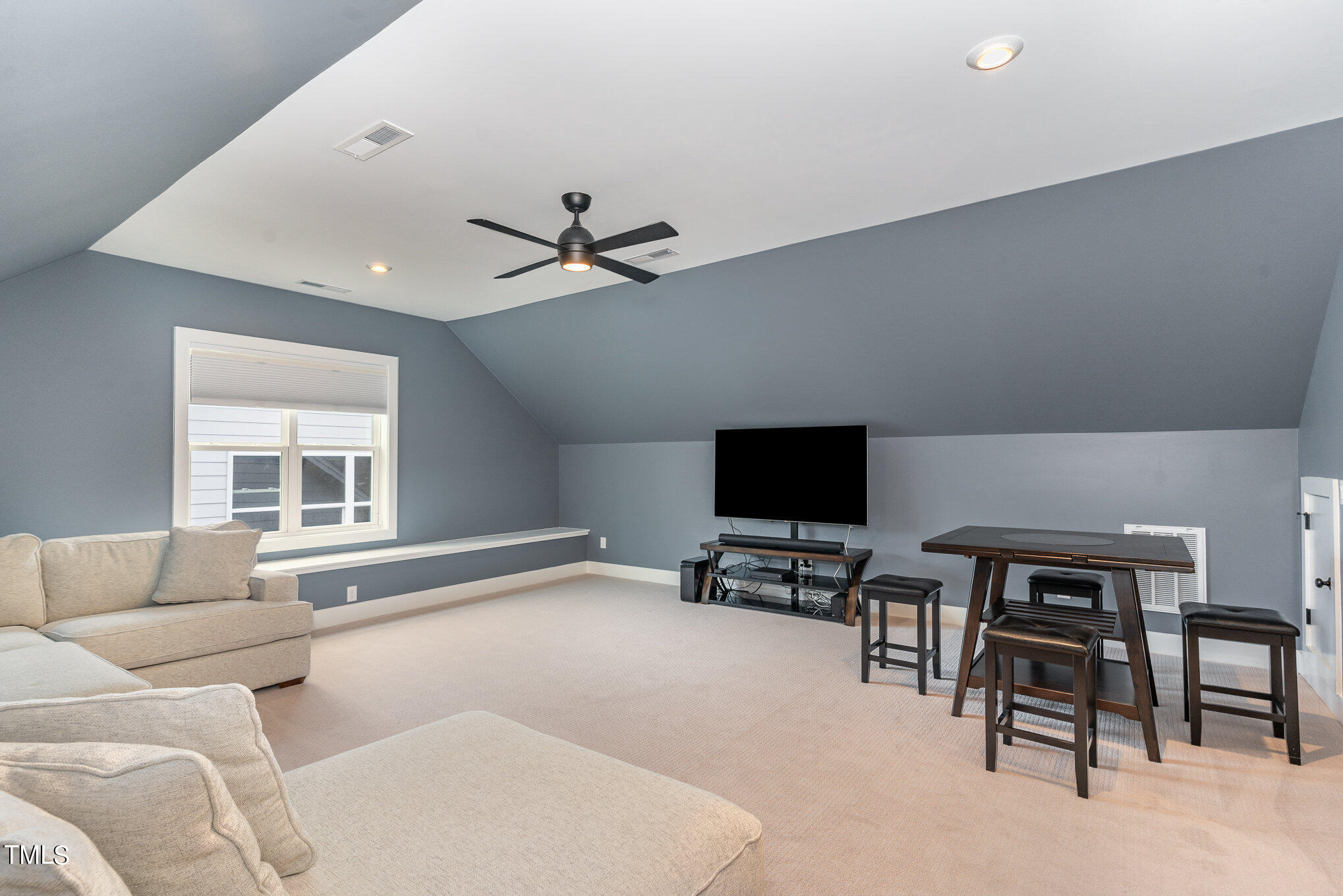 183 Post Oak Road Chapel Hill, NC 27516 - Photo 33 of 51 a living room with furniture and a flat screen tv