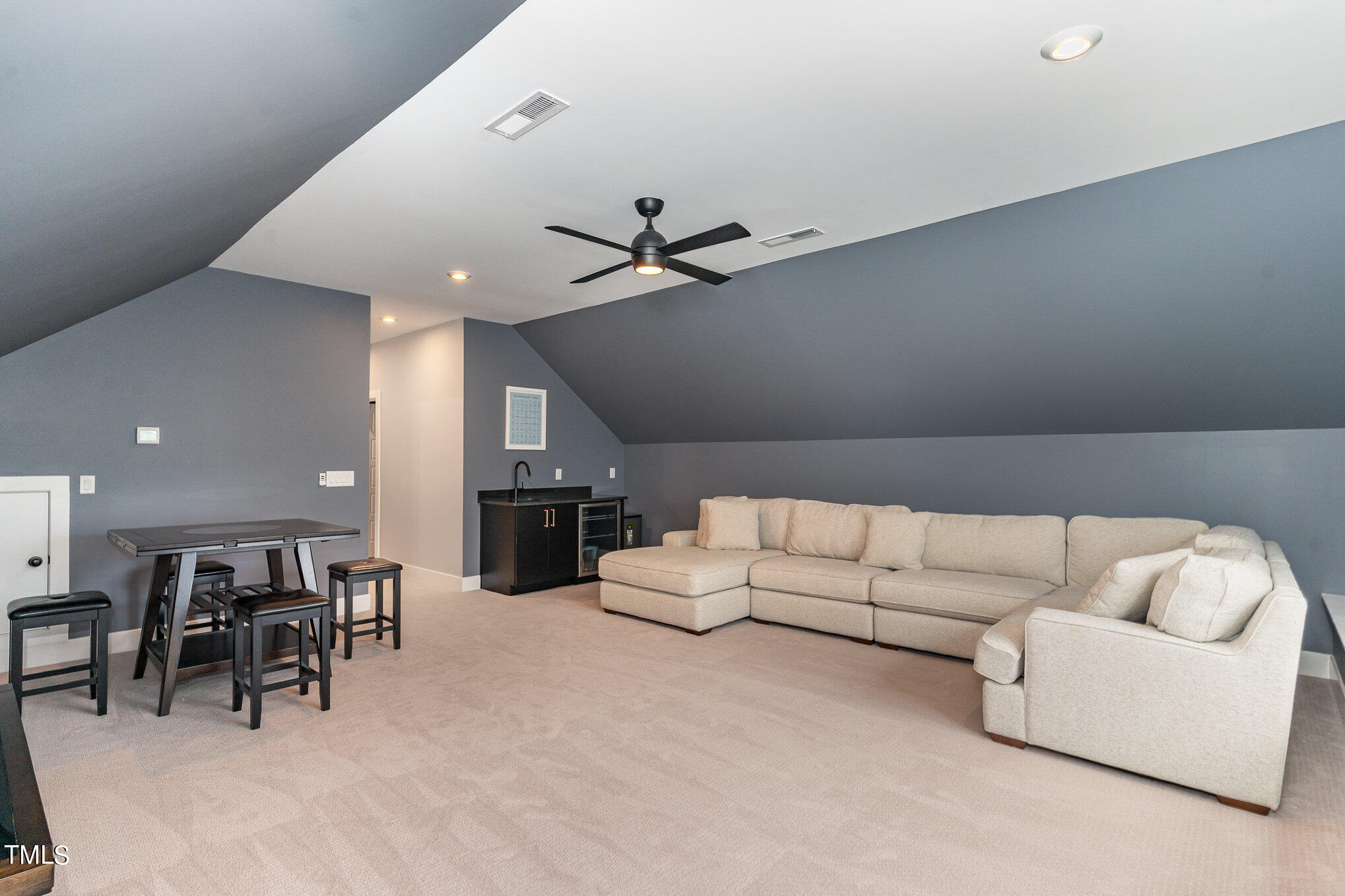 183 Post Oak Road Chapel Hill, NC 27516 - Photo 34 of 51 a living room with furniture kitchen view and a wooden floor