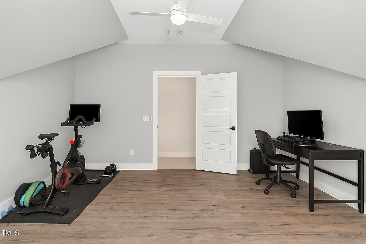 183 Post Oak Road Chapel Hill, NC 27516 - Photo 37 of 51 a view of a workspace with furniture and wooden floor