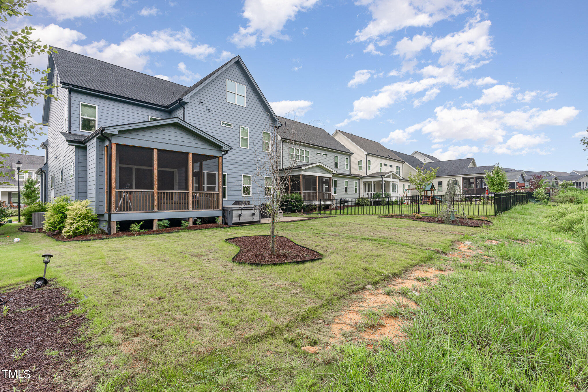 183 Post Oak Road Chapel Hill, NC 27516 - Photo 42 of 51 a view of a house with backyard and porch