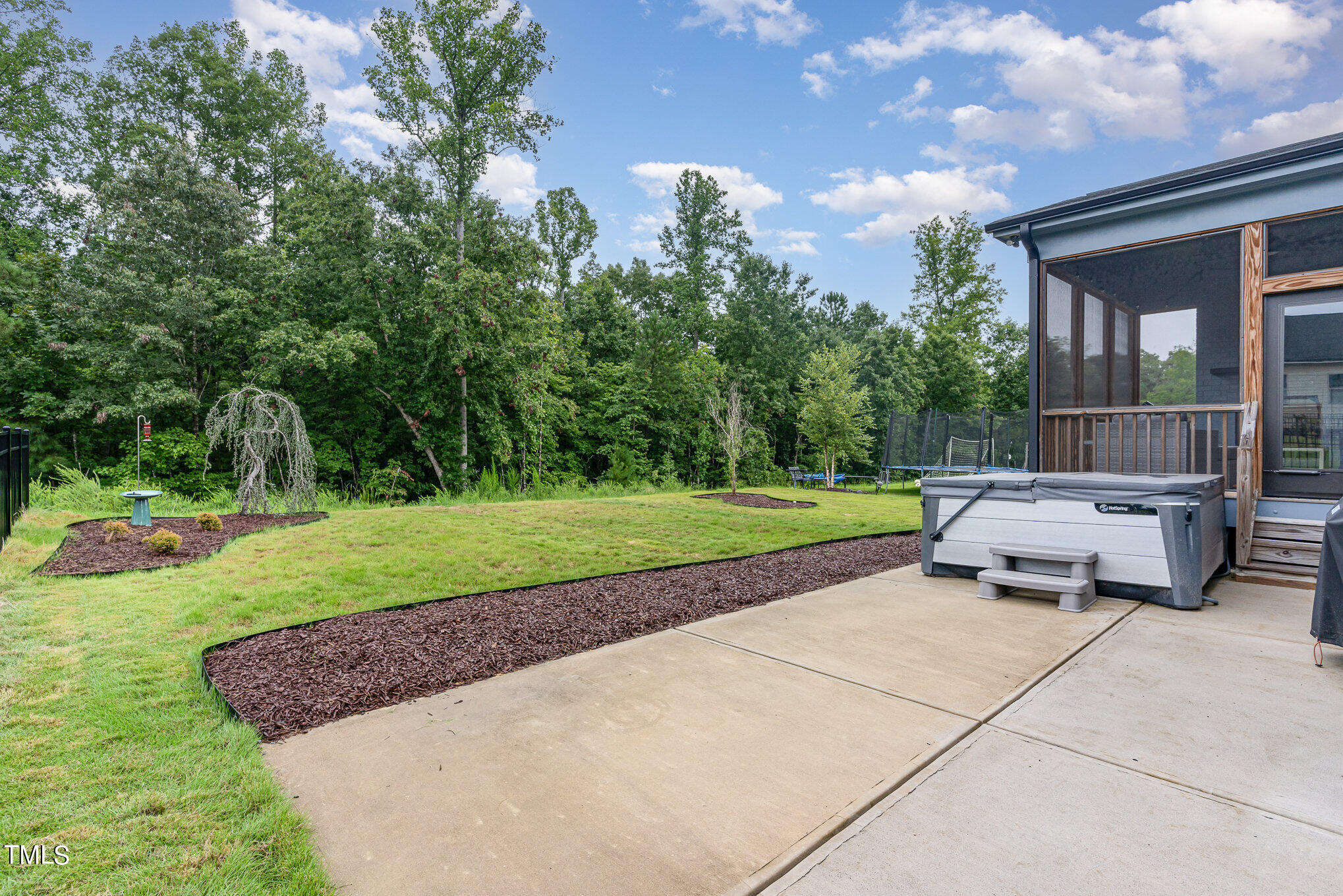183 Post Oak Road Chapel Hill, NC 27516 - Photo 43 of 51 a garden view with a seating space