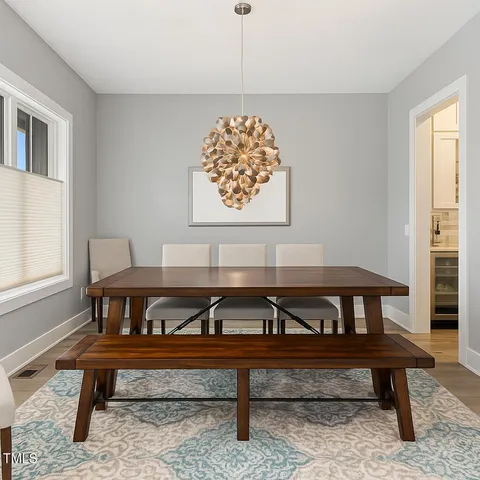 a view of a room with furniture window and wooden floor