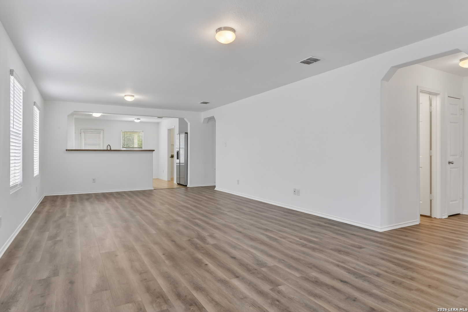 332 Lonestar Gait Selma, TX 78154 - Photo 5 of 24 a view of empty room with wooden floor