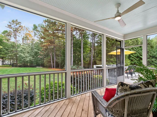 a view of a balcony with furniture