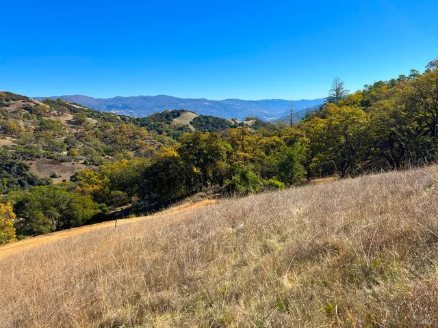 a view of mountain view with mountains in the background