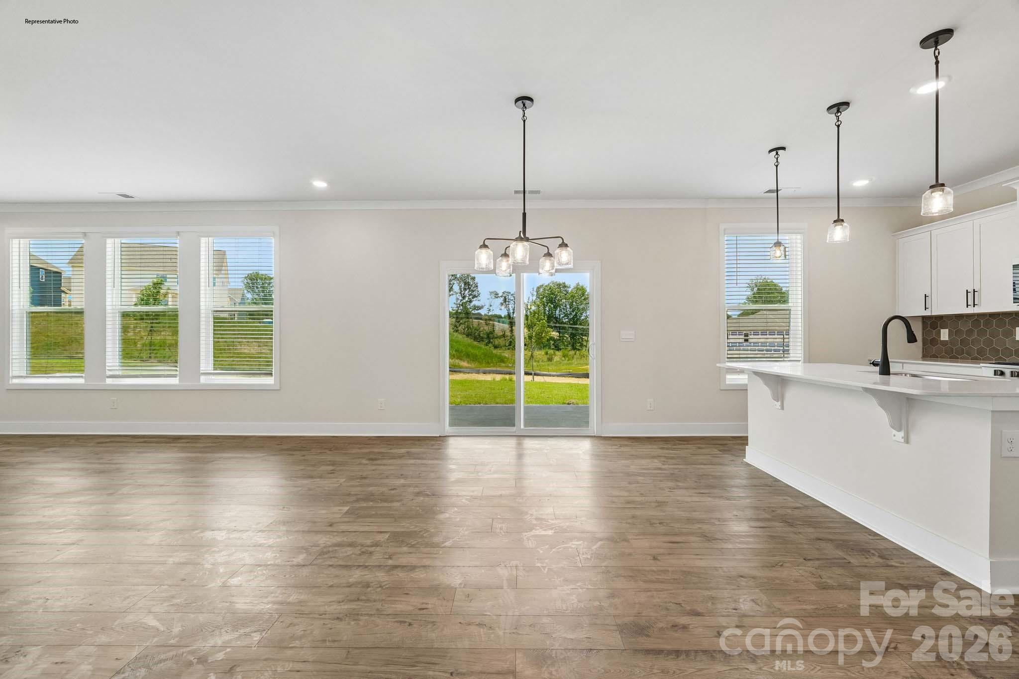 541 Mahogany Road York, SC 29745 - Photo 7 of 32 a view of a kitchen with microwave and windows