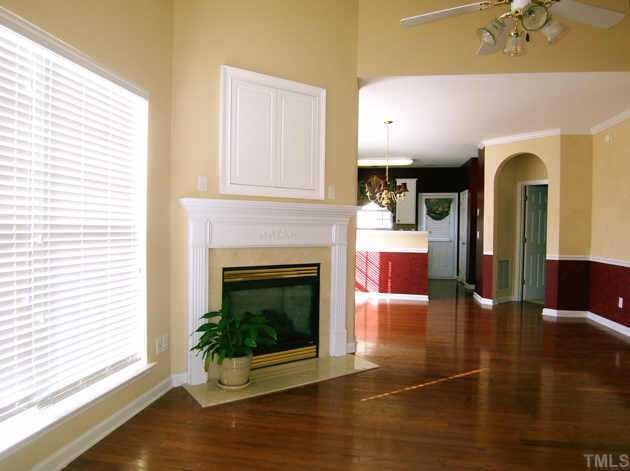 4716 Delta Vision Court Raleigh, NC 27612 - Photo 3 of 12 Notice the gleaming hardwood floors, arched doorways and high ceilings.