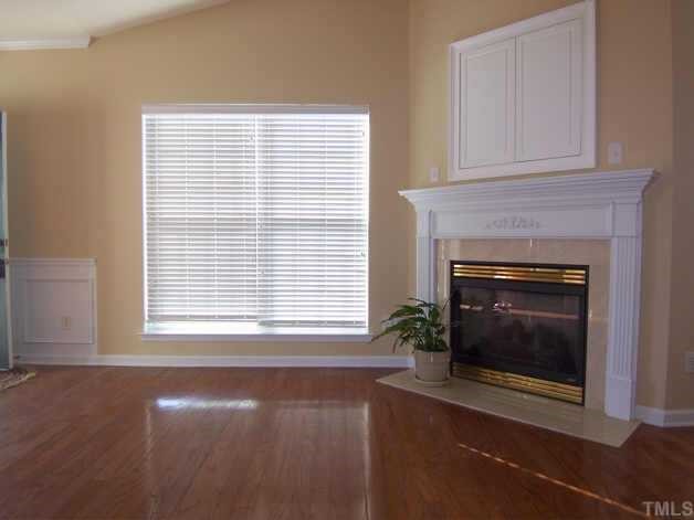 4716 Delta Vision Court Raleigh, NC 27612 - Photo 8 of 12 Another view of the living room.