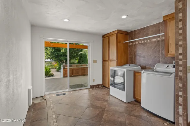 a view of swimming pool with outdoor seating