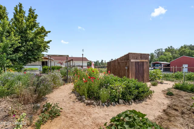 a view of a road with a building in the background