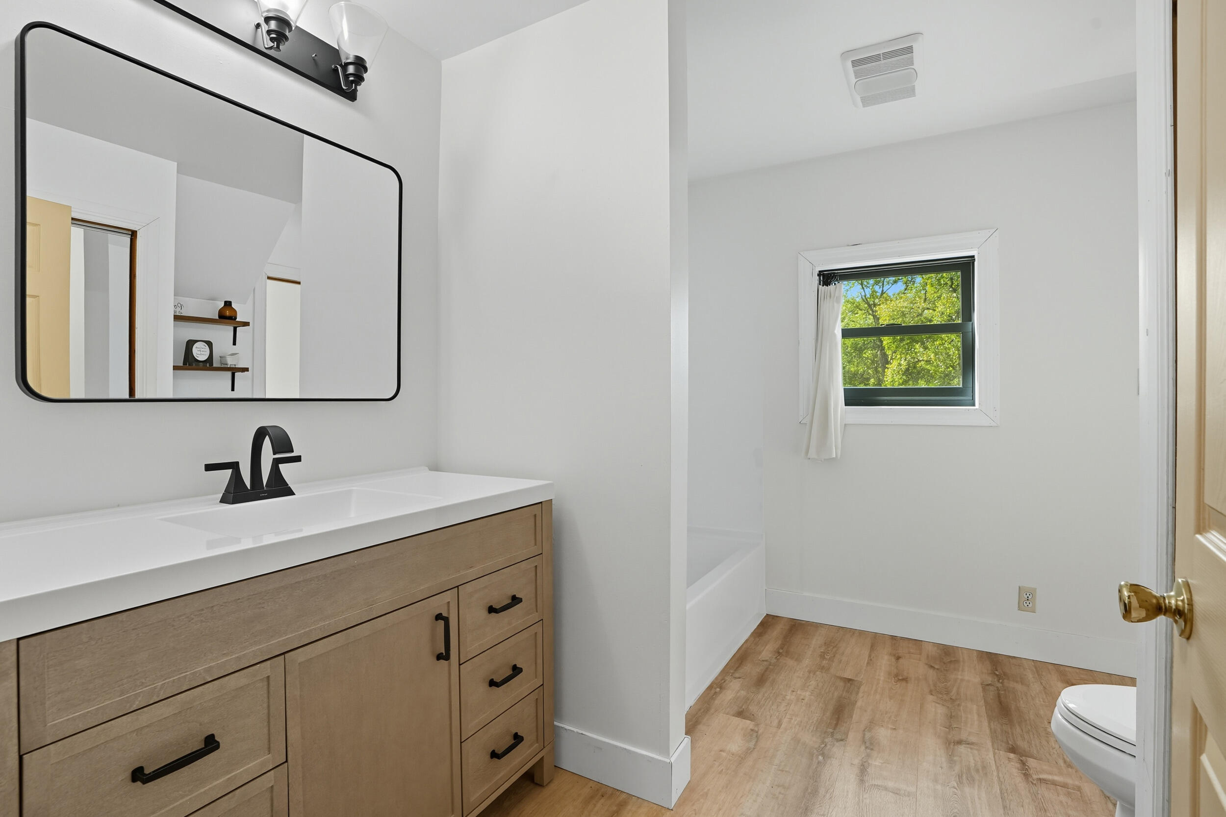 450 East Greening Road Chesterton, IN 46304 - Photo 13 of 56 a bathroom with a sink and a mirror