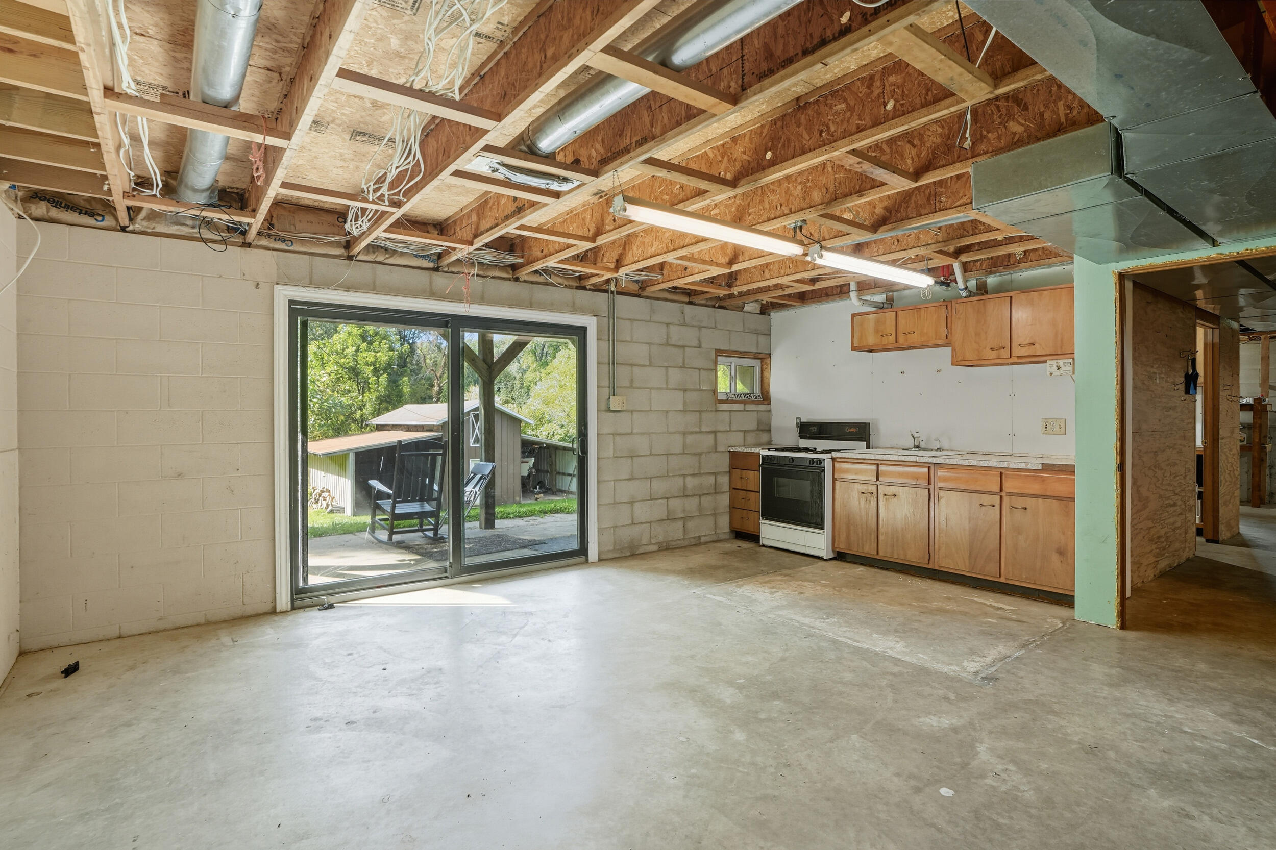 450 East Greening Road Chesterton, IN 46304 - Photo 30 of 56 a view of a garage with wooden cabinets
